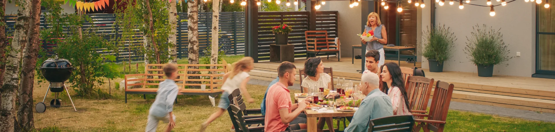 happy family having dinner outside