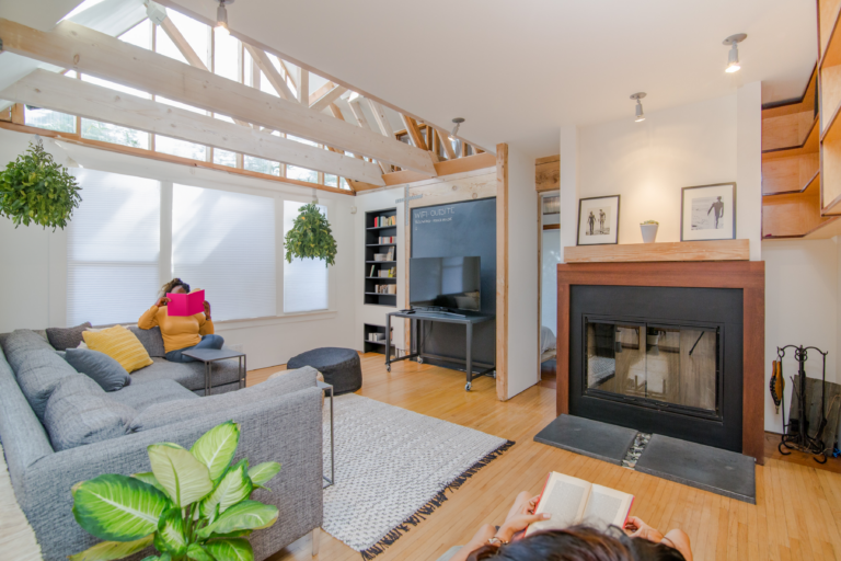 Modern and vibrant living room interior with green plants