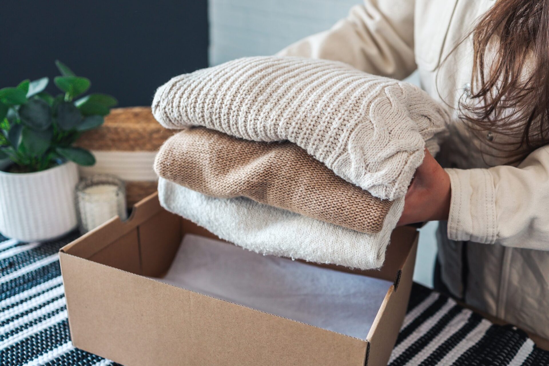Clothing being packaged for storage