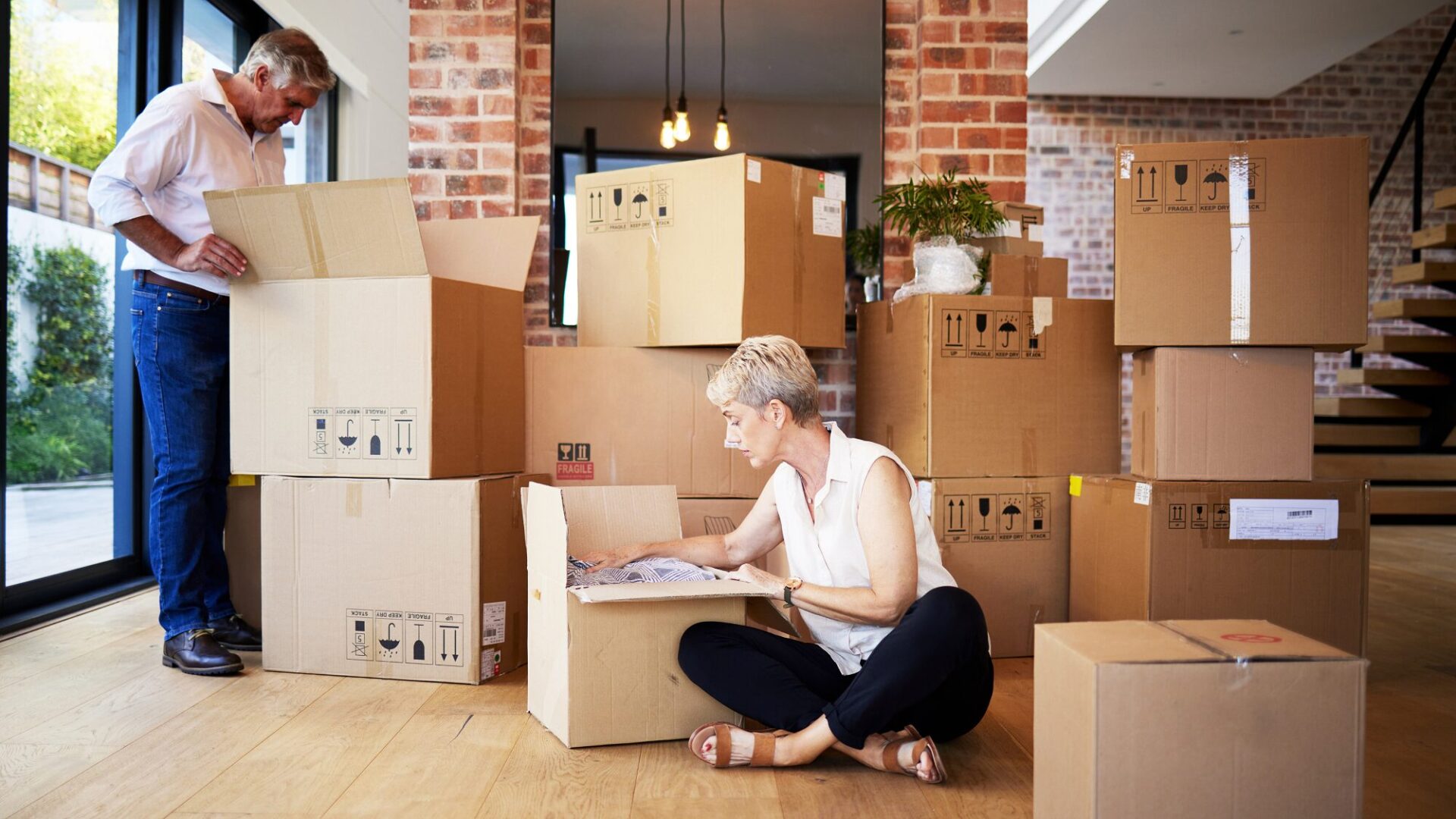 woman packing boxes